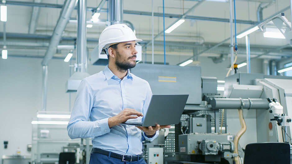 Employees in a factory hall